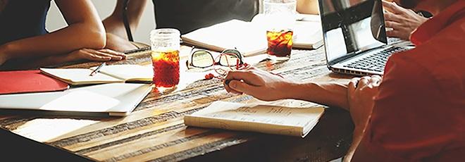 people working at a desk